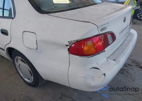 1998 Toyota Corolla Ce from USA, damaged, VIN 2T1BR12E8WC094995